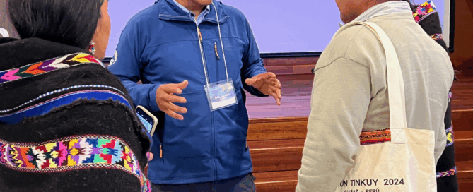 Saúl Luciano Lliuya interacts with community leaders from around Peru during the Hatun Tinkuy 2024. Melting glaciers are a top concern for climate advocates across the Andes and the world. Photo by Julia Klein.
